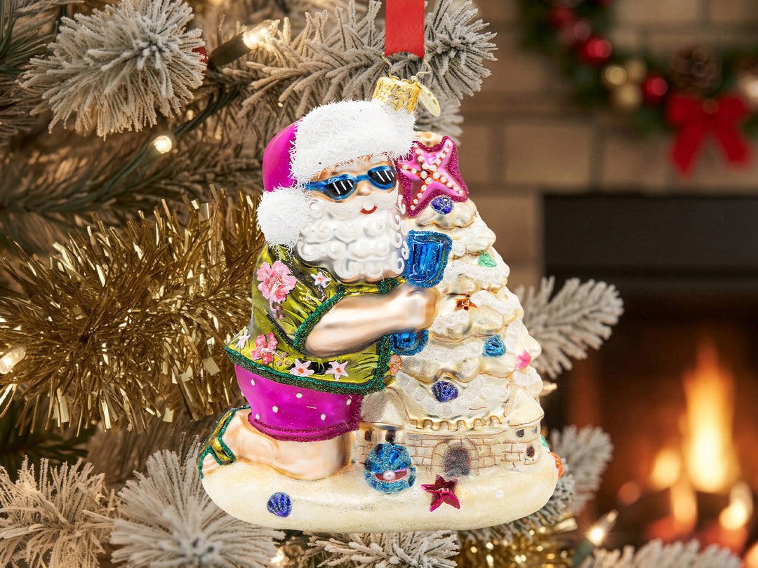 A blue jellyfish ornament with hanging tentacles.