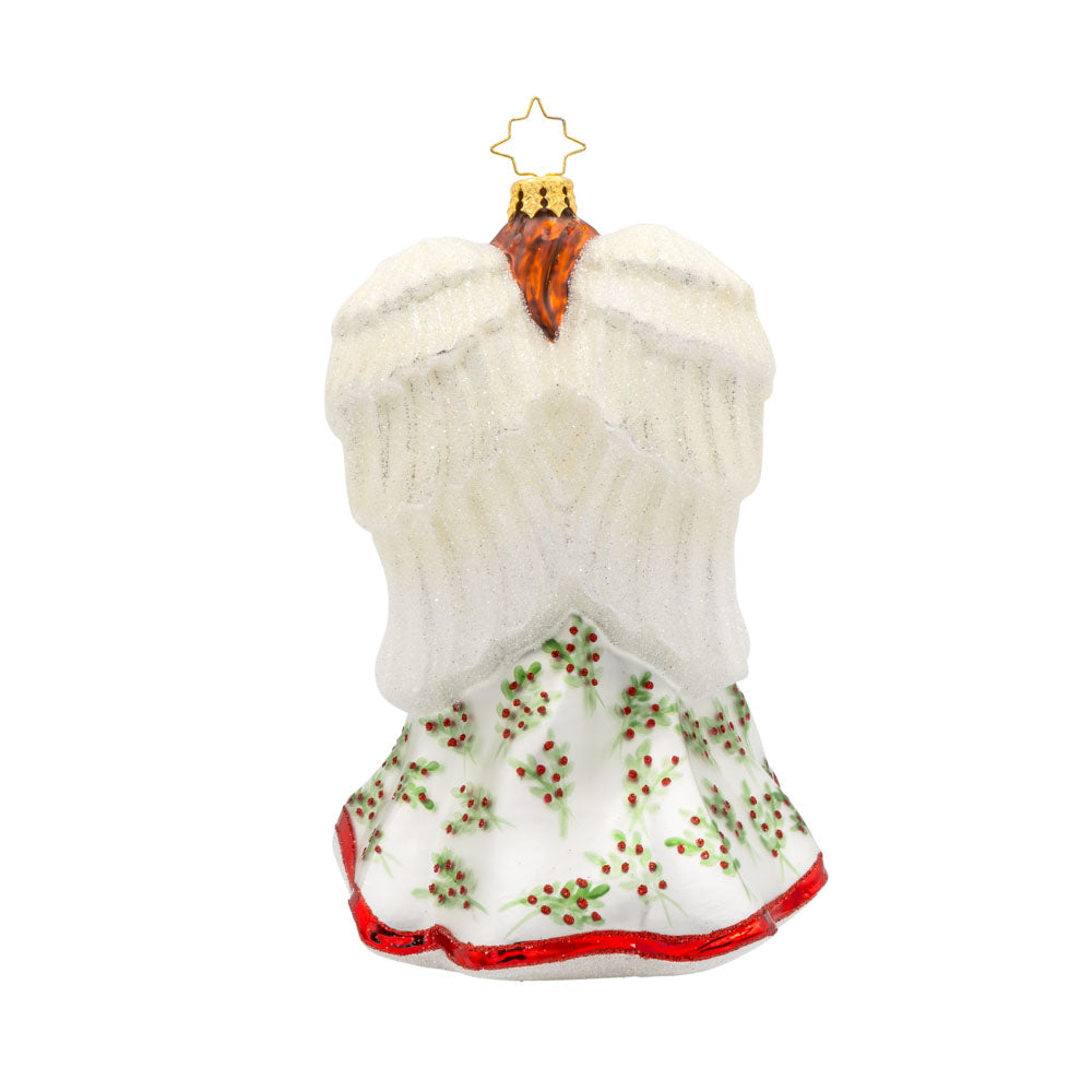 Angelic Poinsettia Herald ornament. Features an angel wearing a flowing hand-painted gown holding a poinsettia bouquet. View of back.