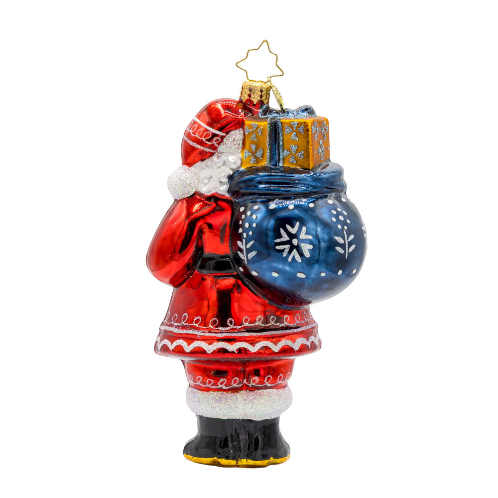 Folklore Father Christmas ornament. With his folk pattern coat and gift sack of presents. View of back.