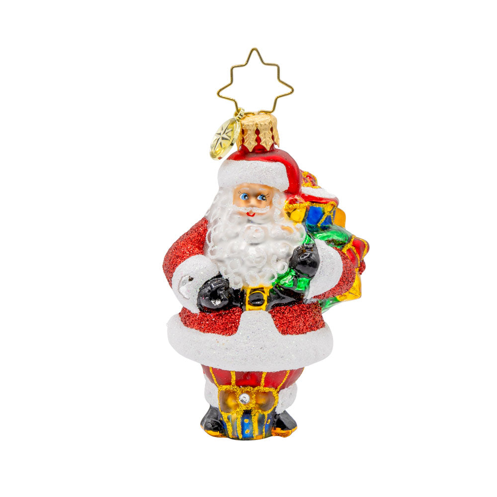 Starlit Holiday Delivery Gem ornament. Santa is holding a large green gift sack of presents. View of front. 