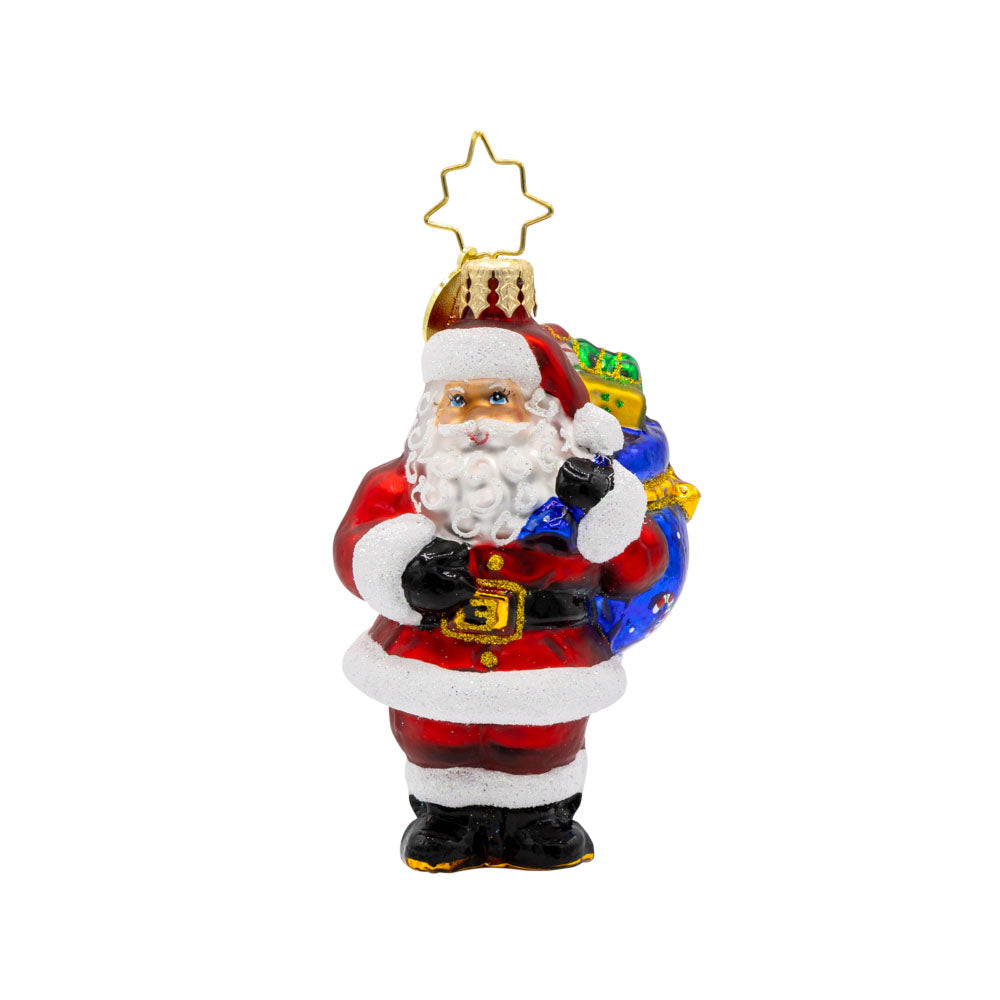 Presents on His Mind Gem ornament. Dressed in red, Santa carries a sack brimming with presents. View of front.