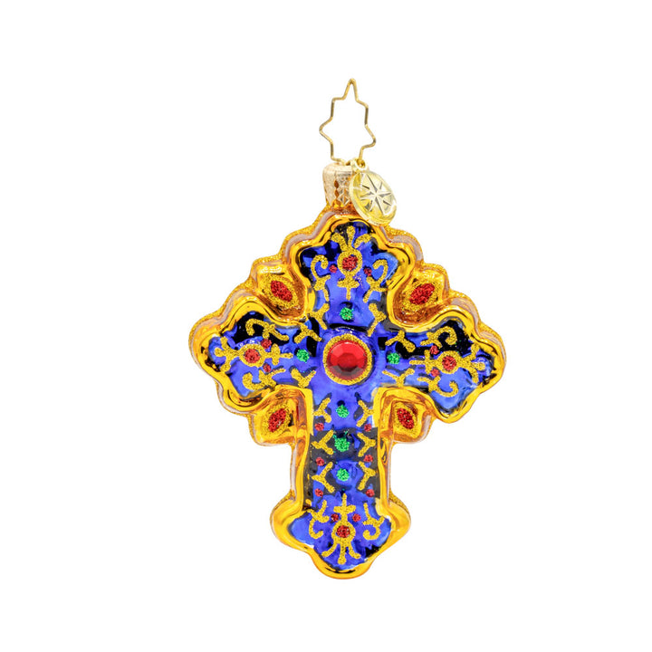 Sacred Season Cross Gem ornament. A gold and blue cross adorned with red and green jewels. View of front. 