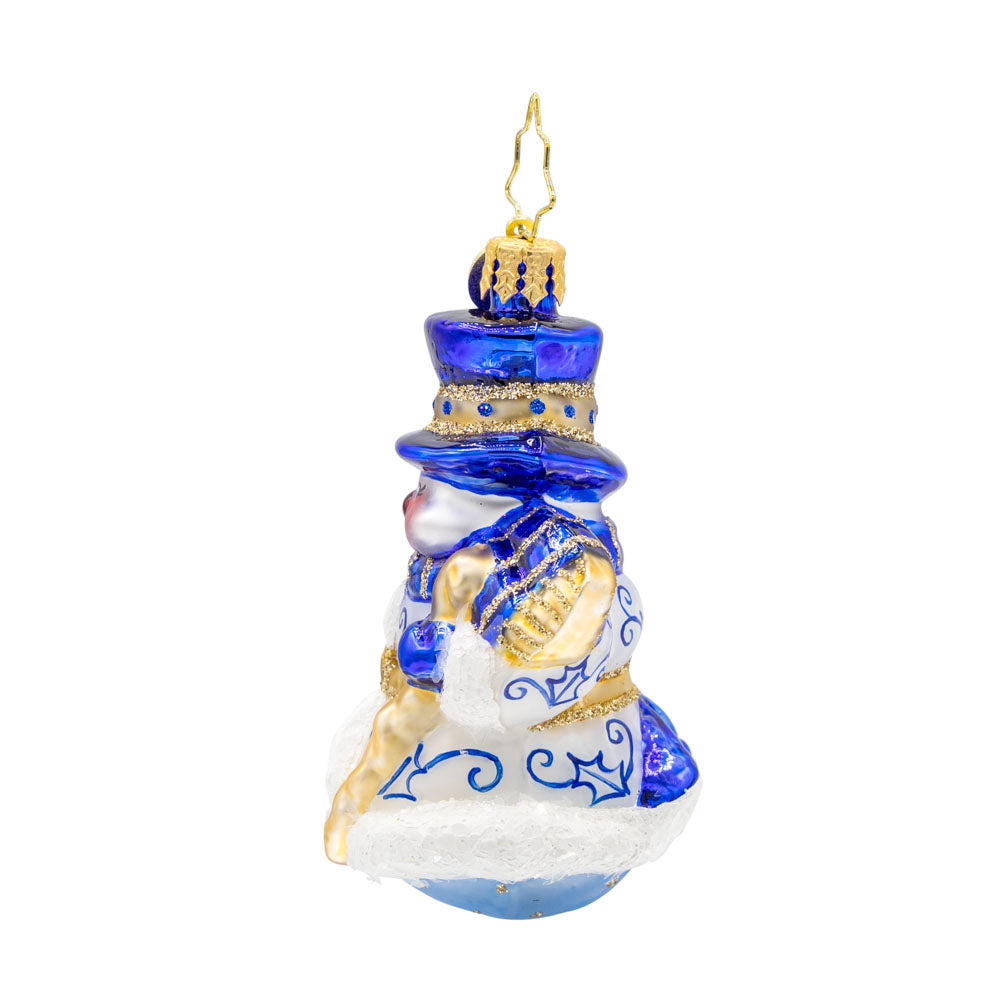 Charming Chinoiserie Snowman Gem ornament. Adorned in robes reminiscent of European Chinoiserie, in a blend of snow white and sapphire blue. View of right side.