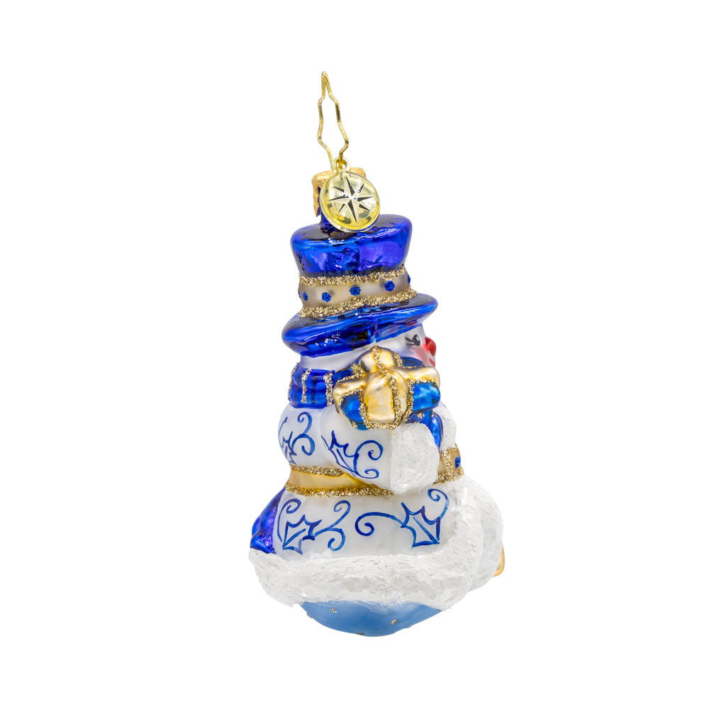 Charming Chinoiserie Snowman Gem ornament. Adorned in robes reminiscent of European Chinoiserie, in a blend of snow white and sapphire blue. View of left side.