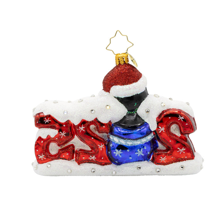 Frosty Flipper Countdown ornament. A penguin pops out of a blue gift bag, making up the zero in "2025." View of back.