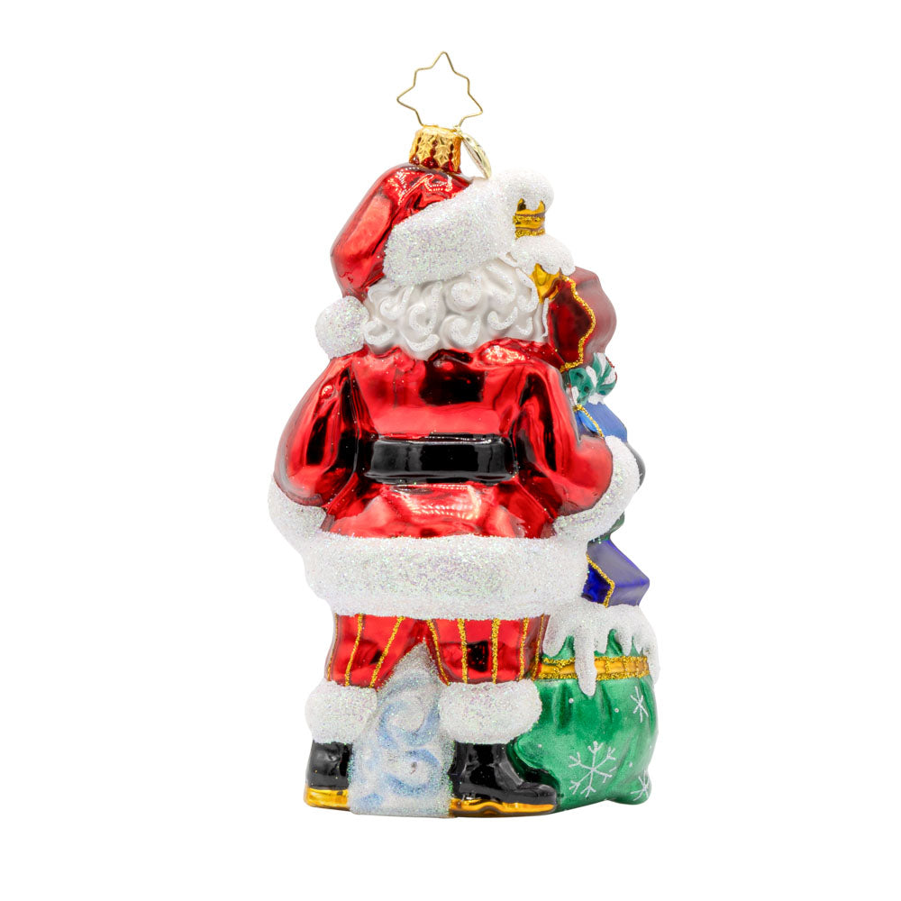 Sign of the Season Santa ornament. Santa stands next to his festive signs that will lead you to the North Pole and beyond. View of back.