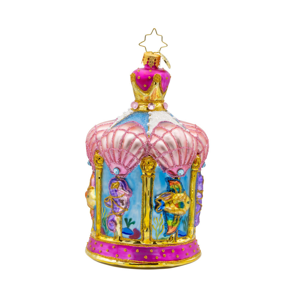 Carousel by the Sea ornament. This ornament features a beautifully detailed carousel adorned with sea creatures like dolphins, seahorses, and starfish. View of front. 