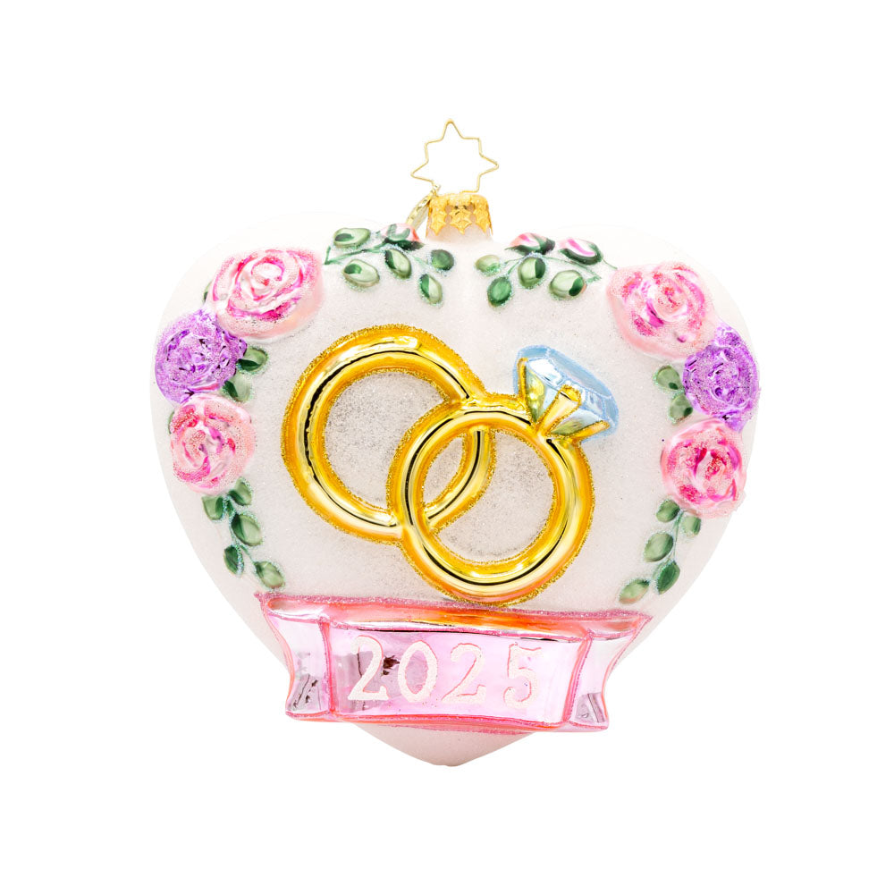 Everlasting Love ornament. Adorned with delicate satin florals and sparkling rings. Dated "2025." View of front.