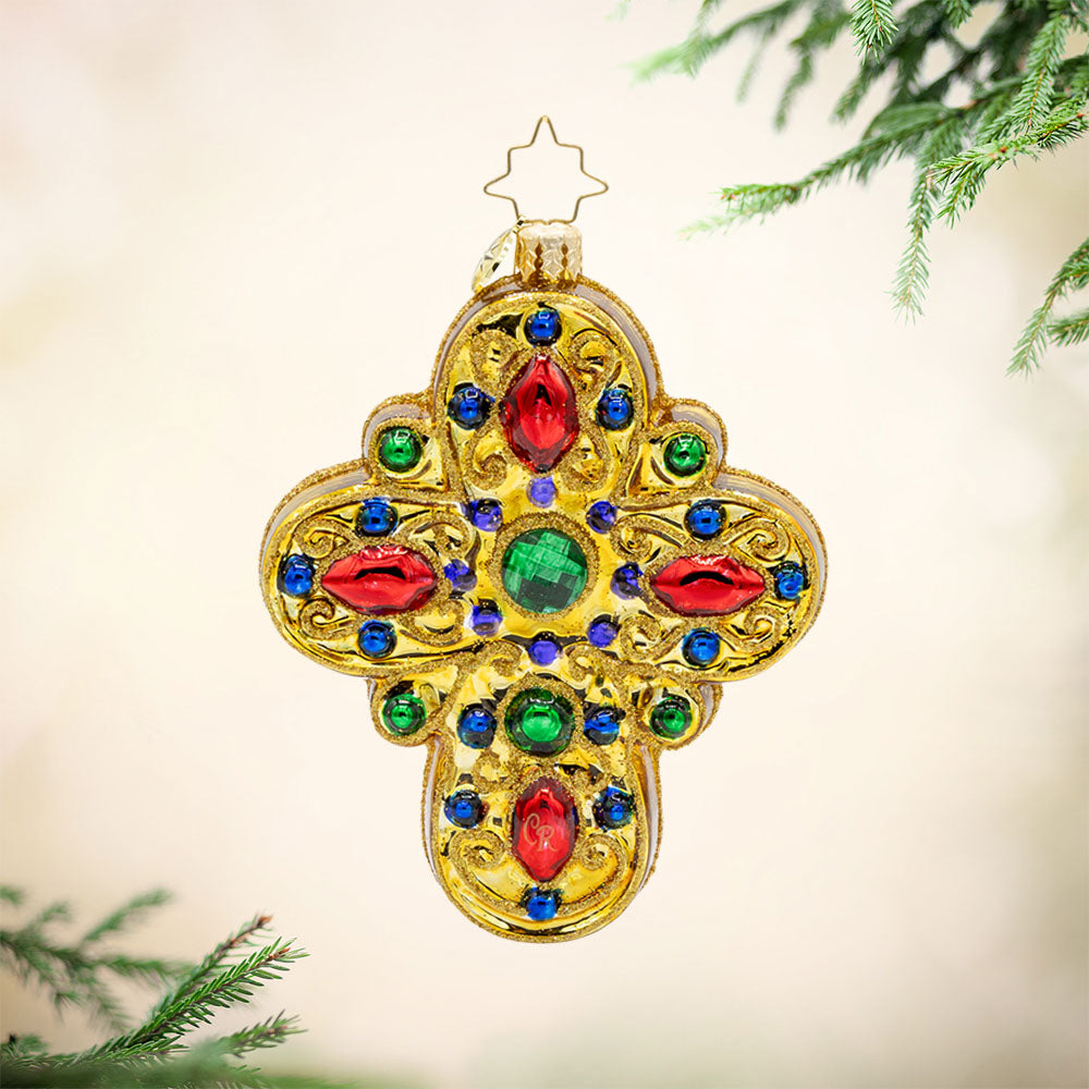 Heavenly Cross ornament. A gold cross with red, green, blue, and purple gems. View of front.