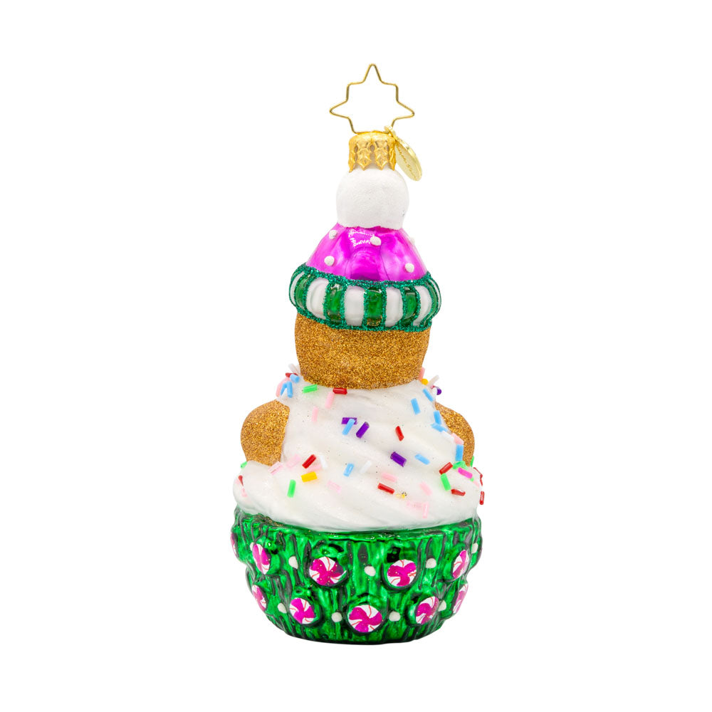 Cookie Cutie ornament. This gingerbread man is perched atop a green and pink cupcake. View of back.