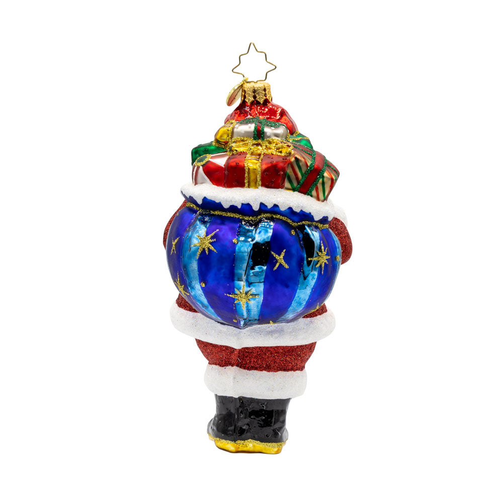 Jolly Old Kris Kringle ornament. Features Santa with his red suit, white beard, and bag of presents. View of back.
