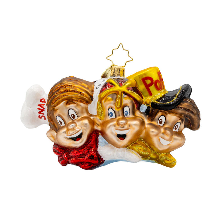 The Breakfast Buddies ornament. Showcasing the Rice Krispies mascots in their classic attire: Snap with his red cap, Crackle with his yellow hat, and Pop with his blue hat. View of front. 