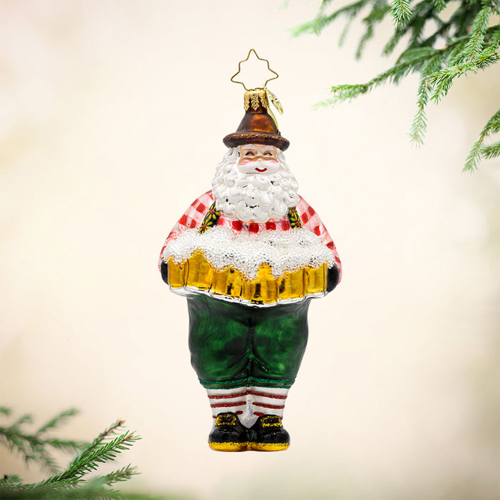 Jolly Ale Santa ornament. Santa is dressed in a festive Bavarian outfit holding multiple beer steins. View of front. 