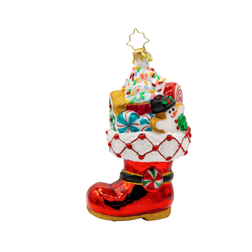 Candy Cane Kick ornament. Features Santa’s classic red boot, brimming with sweet treats. View of back.