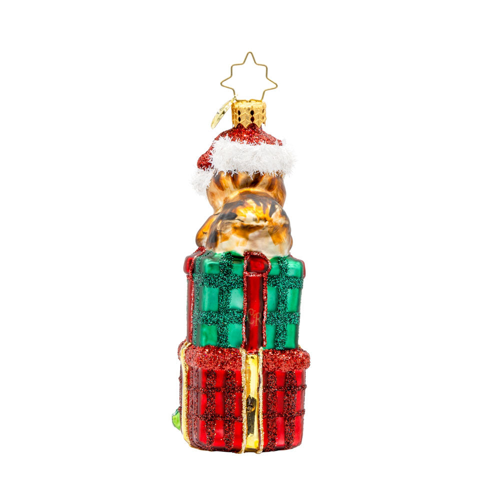 Chipper Cheer ornament. A chipmunk sits atop a stack of gifts with an acorn in hand. View of back.