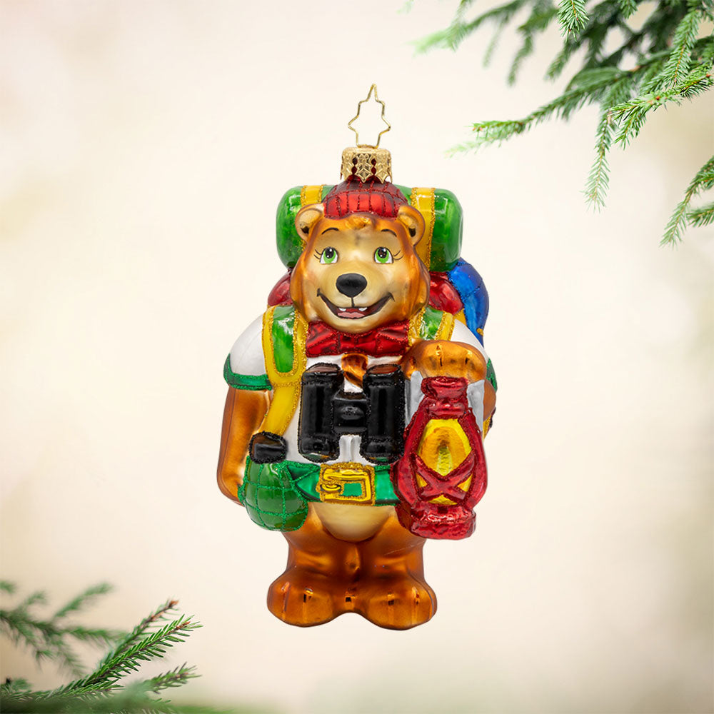 Wilderness Wanderer Bear ornament. This bear has all the camping gear you need. He sports a backpack, lantern, binoculars, plus more! View of front. 