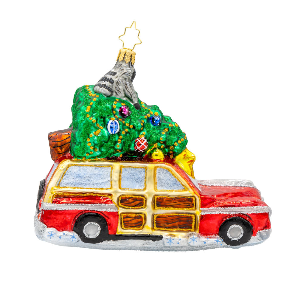 Santa's Woodland Adventure ornament. A raccoon catches a ride on the Christmas tree above Santa's car. View of back.
