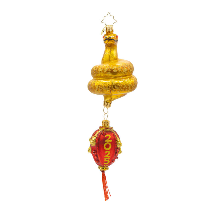 2025 Year of the Snake ornament. A red lantern dangles from a coiled gold snake, adorned with shimmering red accents View of front. 