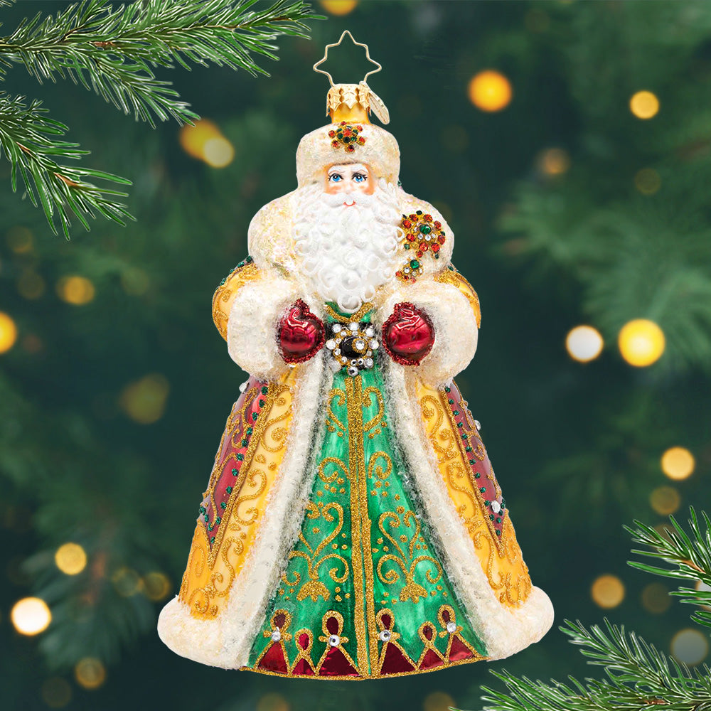 Crown Of Christmas. Santa ornament of him dressed in a red, green, and gold robe with sparkling details and gems. View of front.