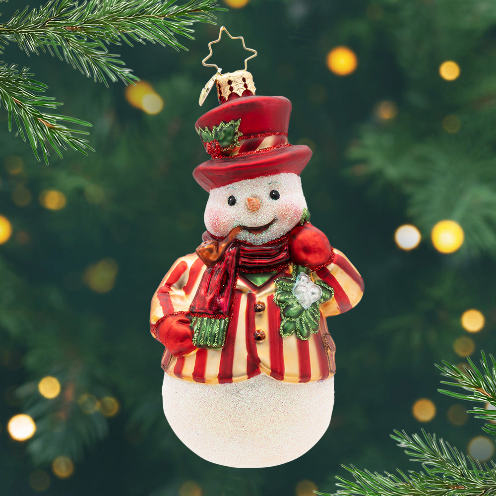 Mistletoe Mischief. A snowman ornament dressed in a red and gold stripped suit. View of front