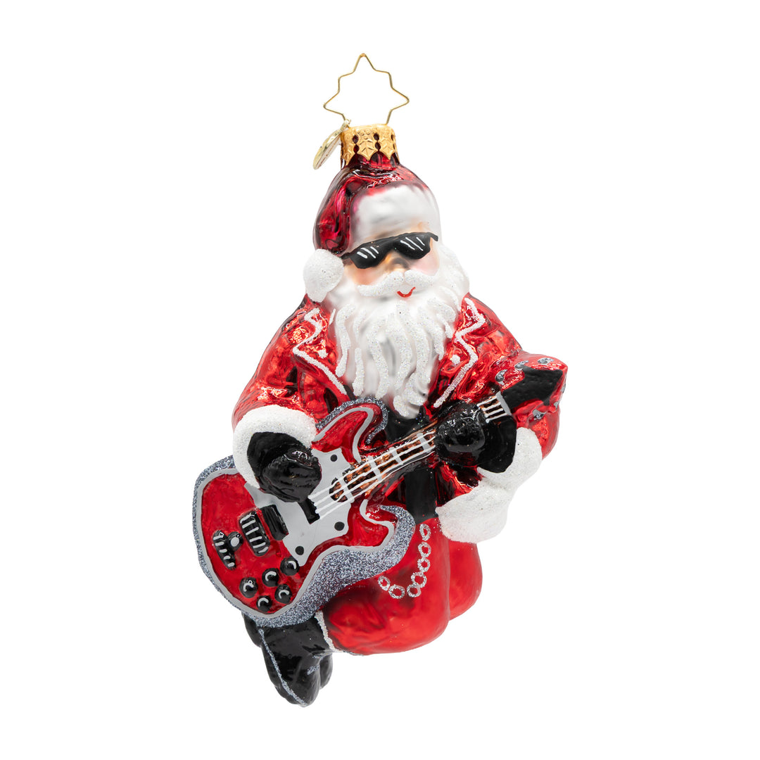 A festive glass Christmas ornament depicting a Santa Claus figure wearing sunglasses and playing a red electric guitar, complete with a gold star hanger on a white background.