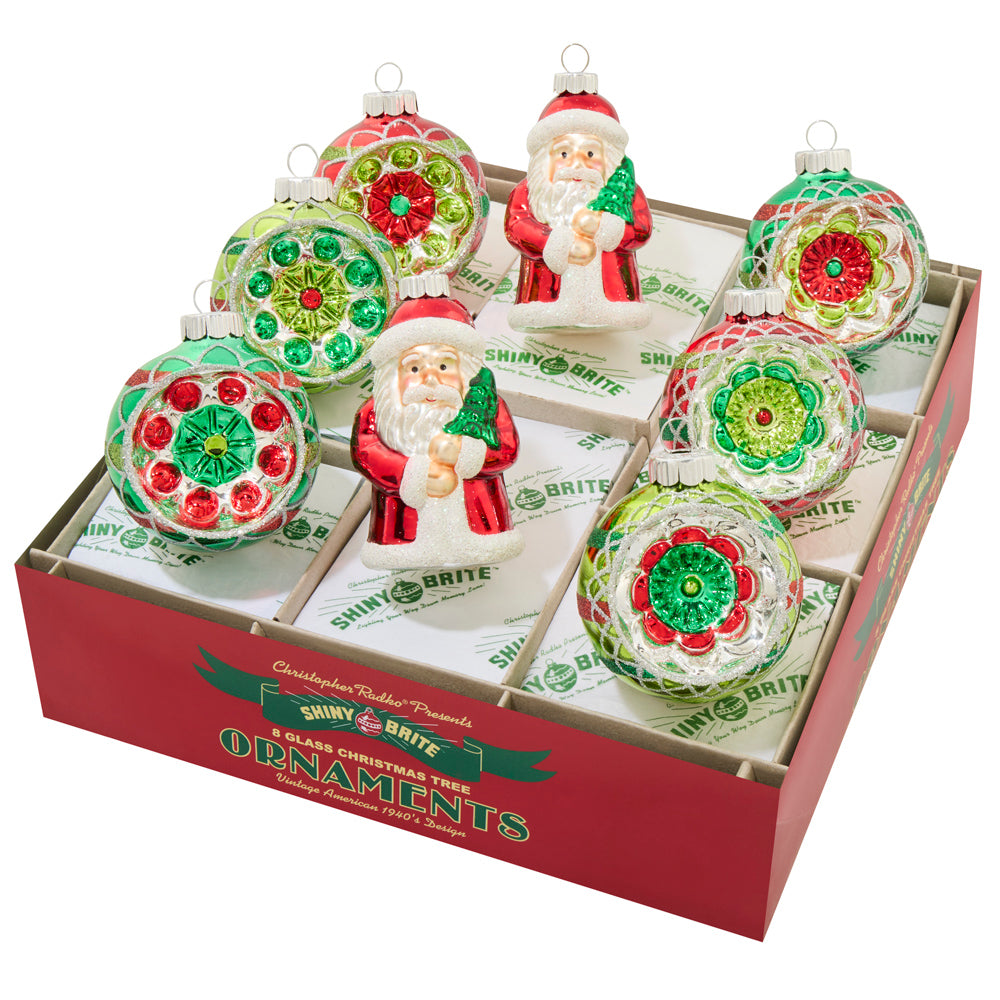 8 vintage-inspired Shiny Brite ornaments. This set features 6 decorated reflector rounds and 2 classic Santas.