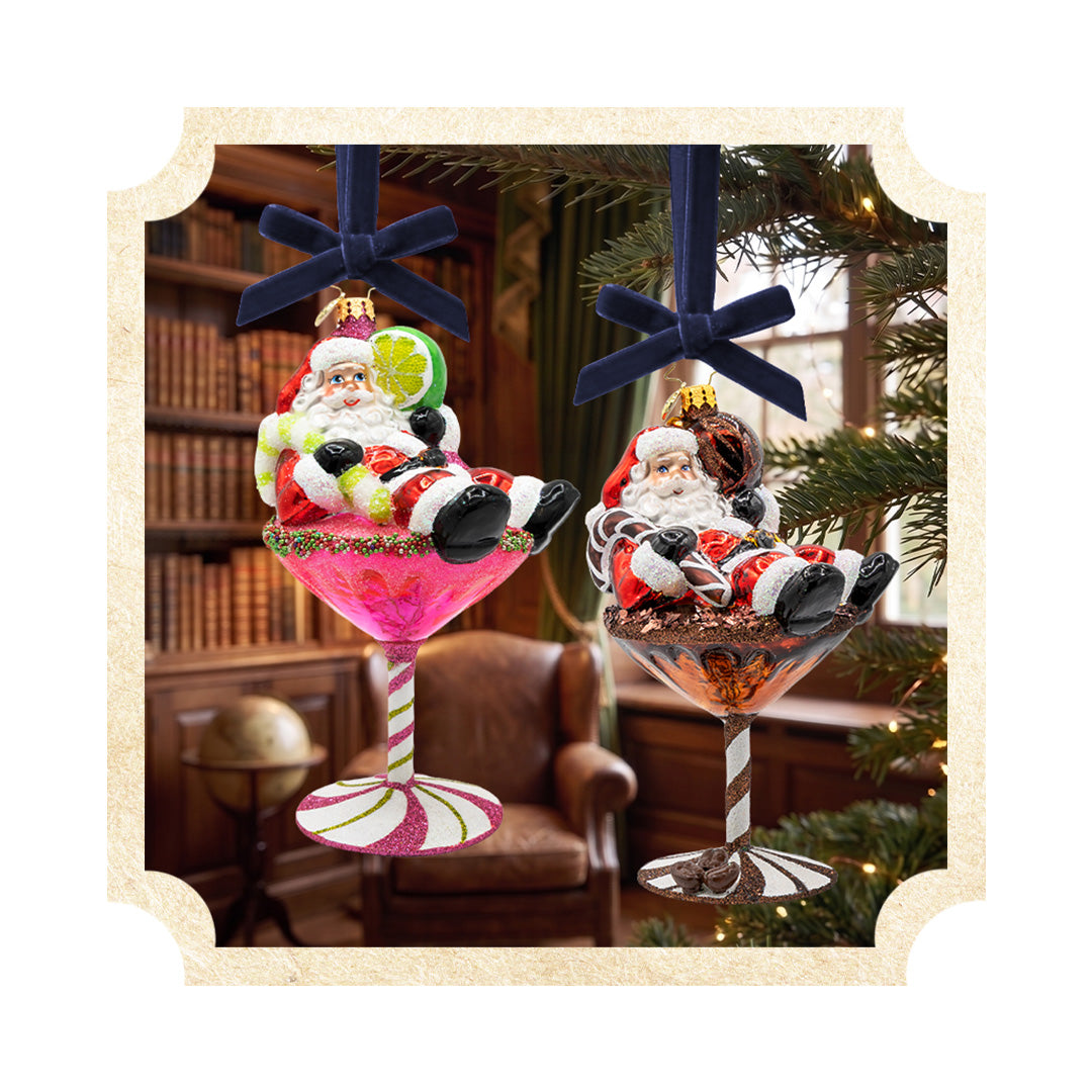 Santa Claus cocktail glass Christmas ornaments featuring pink margarita and chocolate martini designs with dark blue velvet ribbon ties.