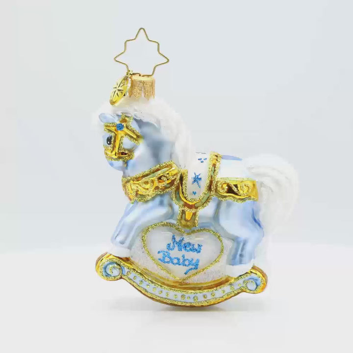 Baby's First Christmas Foal Gem ornament. A powder blue rocking horse with "New Baby" written on the side. Video.
