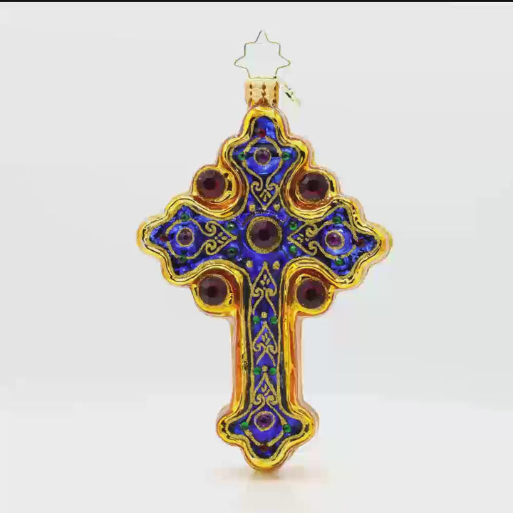 Sacred Season Cross Gem ornament. A gold and blue cross adorned with red and green jewels. Video