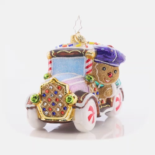 Video - Ornament Description - The Treatmobile: Beep beep! With shimmering peppermint rims and gumdrop detailing, this sugar-powered cookie car is one sweet ride. This video shows the ornament spinning slowly. 