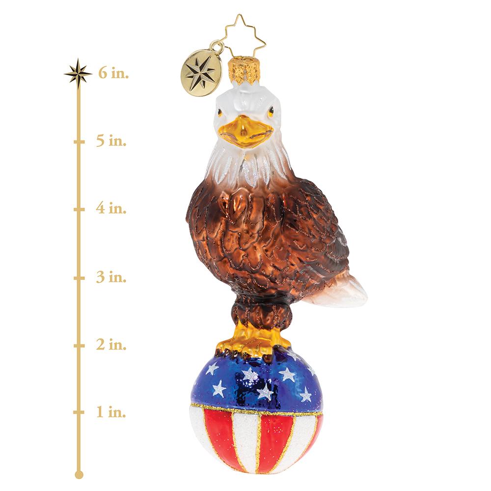Ornament Description - Stars & Stripes Bald Eagle: Like an eagle who soars from coast to coast, from sea to shining seaâ€”it's good to be an American, living wild and free. This photo shows the ornament is about 6 inches tall. 