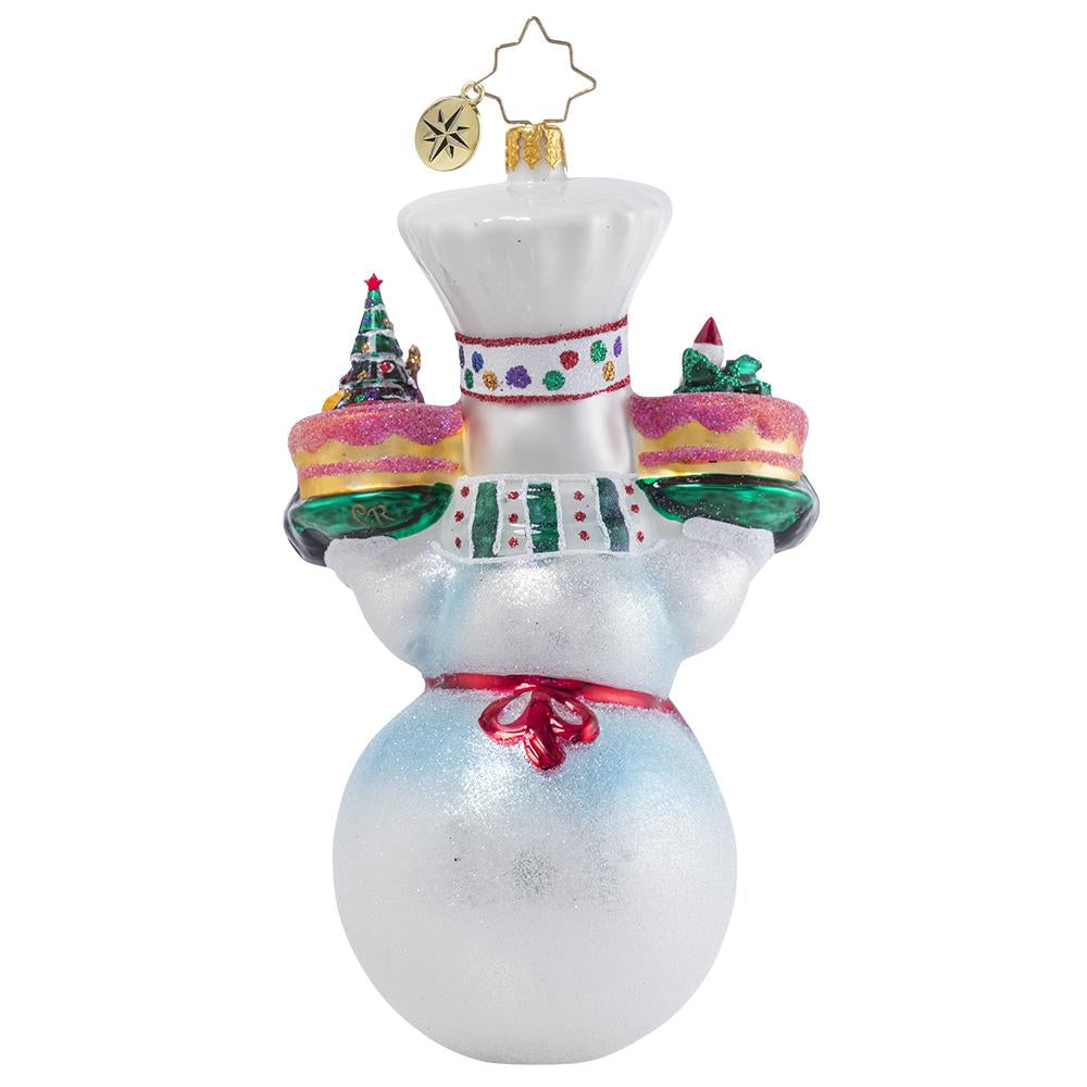 Back - Ornament Description - This Christmas Takes The Cake!: Mr. Snowman has been hard at work in his magical bakery, whipping up all types of sweets as the holidays draw near. These Christmas cakes are sure to fly off the shelves--no one can resist his frosty treats!