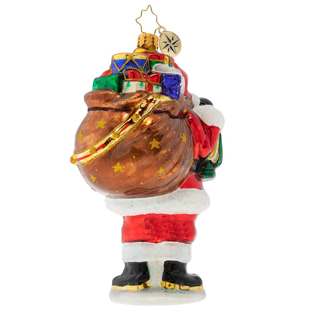 Back - Ornament Description - Our Gallant Guide: The city may be sleeping, but Santa's glowing lantern lights the way as he carries his magic sack of gifts through the darkness of Christmas Eve night.
