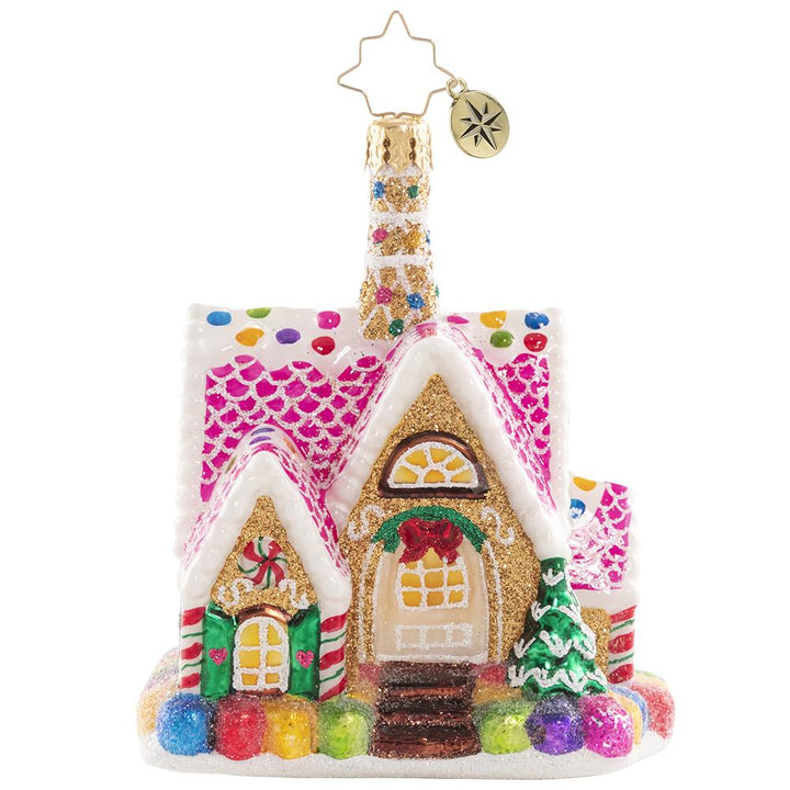 Ornament Description - A Delectable Dwelling Gem: Goody goody gumdrops! Adorned with sweetness on all sides, this itty-bitty gingerbread cottage is total candy-covered confection perfection.