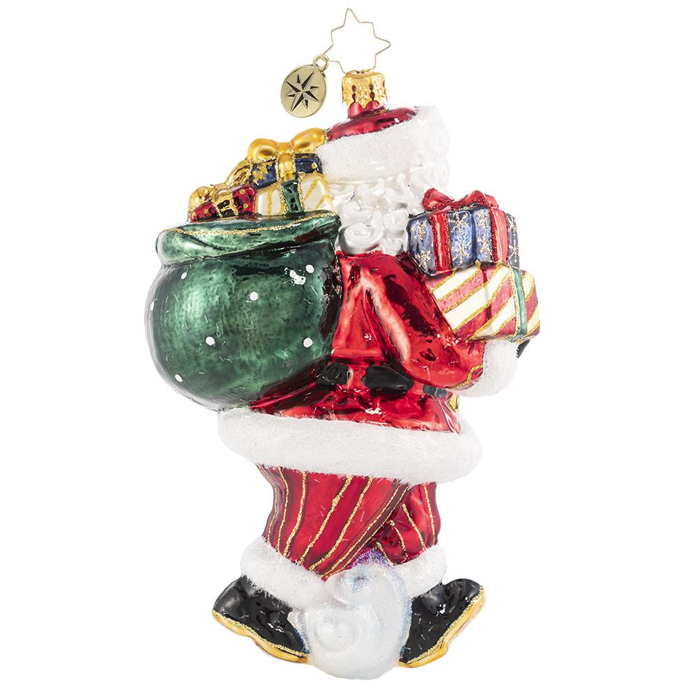 Back - Ornament Description - AIDS Charity Claus: Santa carries a red ribbon to raise AIDS awareness and to deliver hope to anyone affected by the disease this holiday season. A percentage of proceeds from the sale of this ornament will benefit AIDS research.