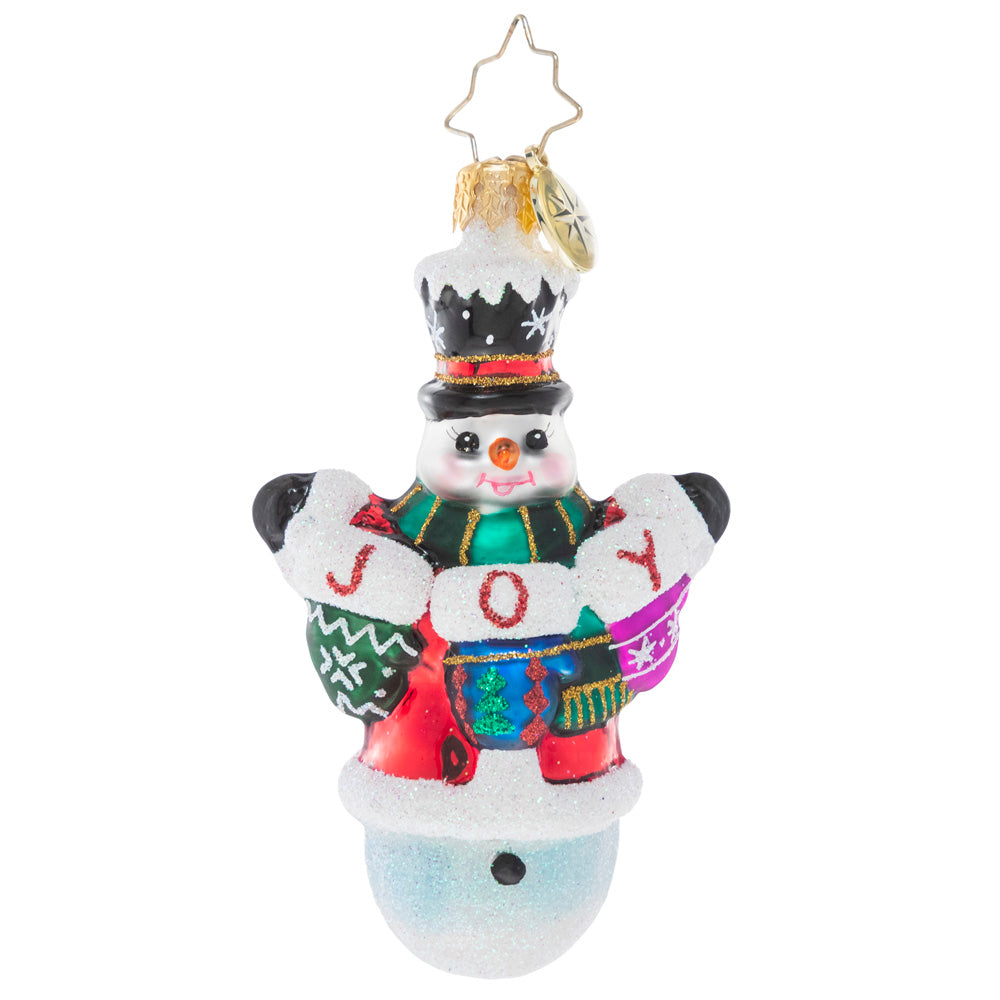 Front - Ornament Description - Crochet All Day Gem: This little snowman has been hard at work with his crochet needles! He's proud as punch to show off his heartfelt, hand-made holiday message.