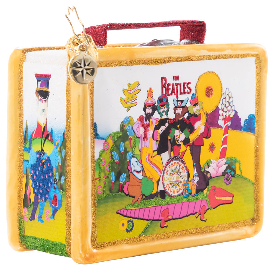 Side View - Ornament Description - Let's Do Lunch: Fashioned after the classic tin lunch boxes of yesteryear and featuring colorful scenes from Yellow Submarine, this playful piece packs a powerful punch of nostalgia. Is it lunchtime yet?