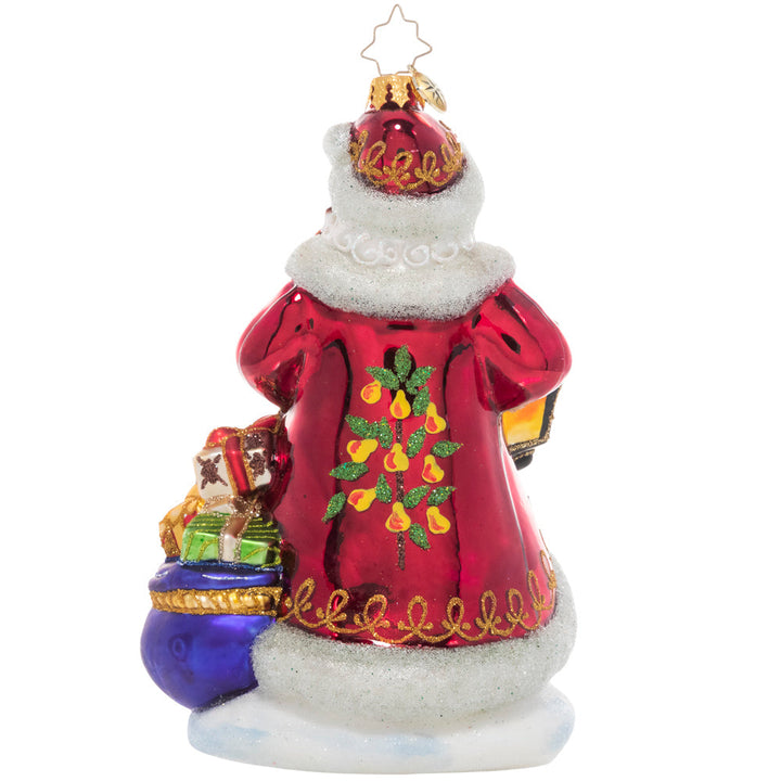 Back - Ornament Description - Santa's Pear Tree: The premier piece in our Ornament of the Month collection, this elegant ornament features a traditional Santa Claus presiding over a golden pear tree topped with a colorful partridge bird.