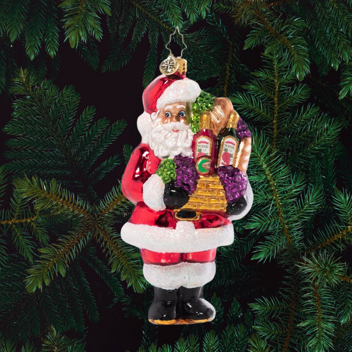 Ornament Description - Wine Night Santa: Santa didn't forget the grownups on his good list this year – he comes bearing gifts of wine, cheese and baguettes. Cheers everybody!