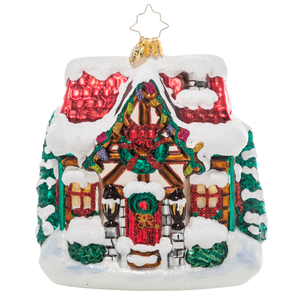 Front - Ornament Description - The Coziest Cottage: The snow is coming down! Drifts are piling up and this little cottage is looking cozier by the minute with its holiday lights and a festive wreath.