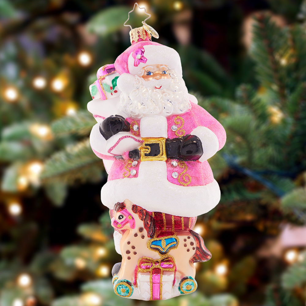 Ornament Description - Think Pink Santa: Pink is stronger than you think! Santa will always support those near and dear to us in honor of breast cancer awareness. A percentage of sales from this special ornament will benefit Breast Cancer Research.