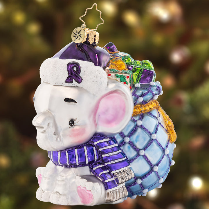 Ornament Description - An Elephant Never Forgets!: An elephant who never forgets to treat others, no matter what they're going through, with compassion, love, and respect. A percentage of the sales from this ornament will benefit Alzheimer’s awareness.