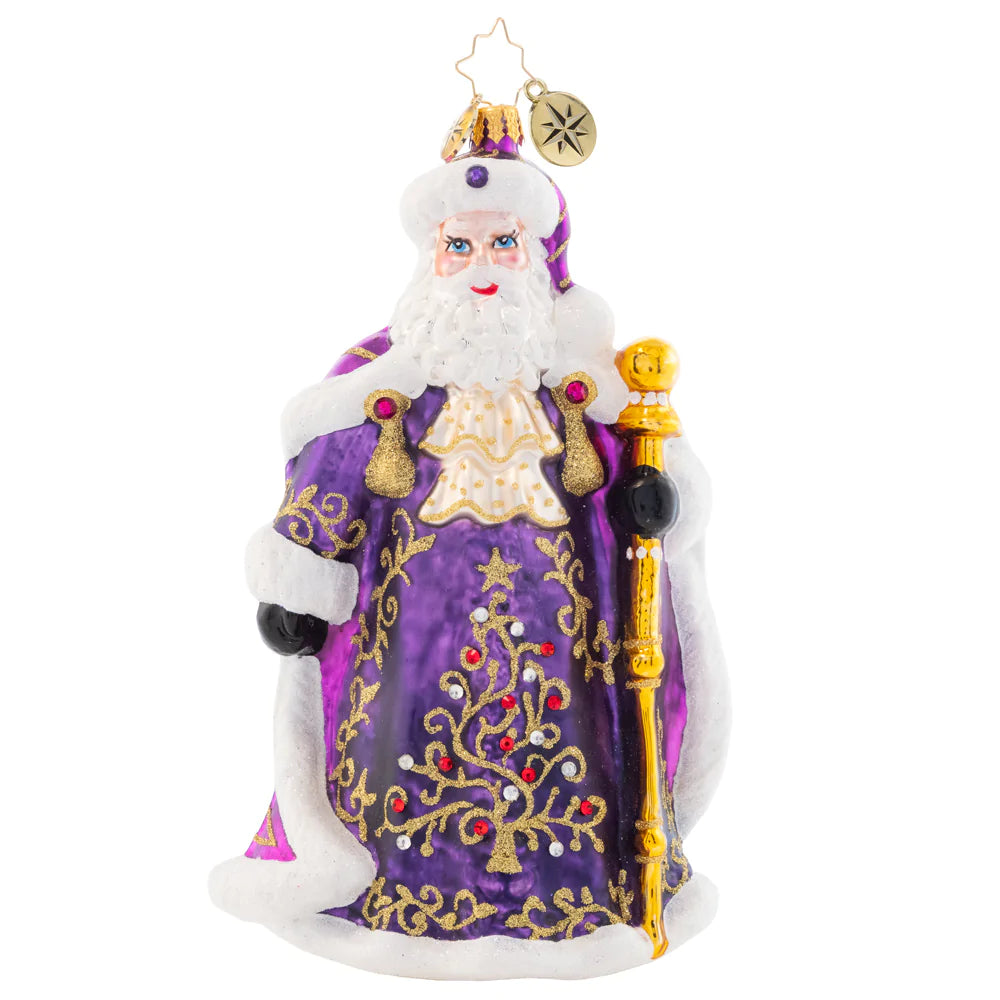 Ornament Description - A Vision in Purple: Dressed head-to-toe in vibrant violet robes, this stunning Santa Claus brings an opulent elegance to your Christmas tree.