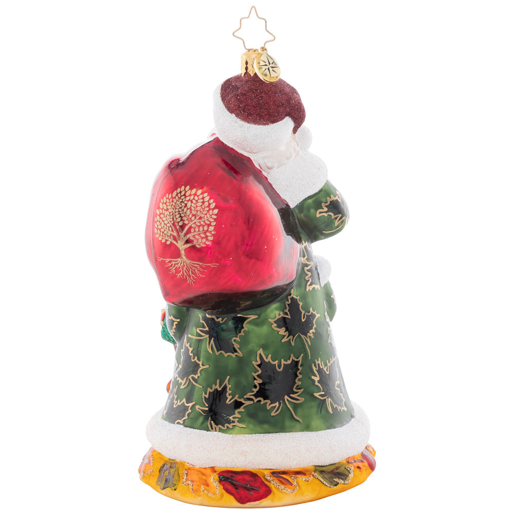 Back - Ornament Description - Autumn Colors: The ninth piece in our Ornament of the Month collection celebrates autumn! Festive as ever for the fall harvest, Santa is sporting a lovely leaf-covered cloak.
