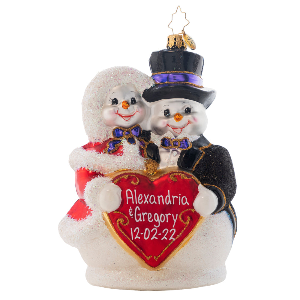 Ornament Description - Snowy Sweethearts: Can't wait to face all your Winter Wonderland plans? Personalize this ornament as an everlasting symbol of your love and devotion! Note: Please allow approximately one month (on top of shipping time) for our elves to personalize your ornament.