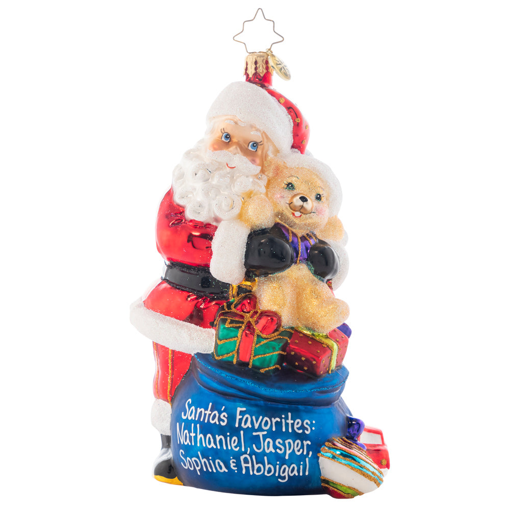 Ornament Description - Santa's Special Gift to You: Whatever it takes to treat it--a toy, a kiss, a visit from a friend. Your child deserves wholeness on the holiest of days. Add a name or holiday wish to Santa's bag of treats to make the is truly unique piece. Note: Please allow approximately one month (on top of shipping time) for our elves to personalize your ornament.
