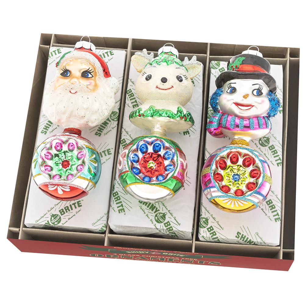 Ornaments - Description: Christmas Confetti 3 Count 5.5" Figure Rounds - This trio of classic Christmas characters is sure to make a cheery statement! Welcome a jolly Santa Claus, a darling reindeer, and a smiling snowman to your collection with this charming 3-count set.