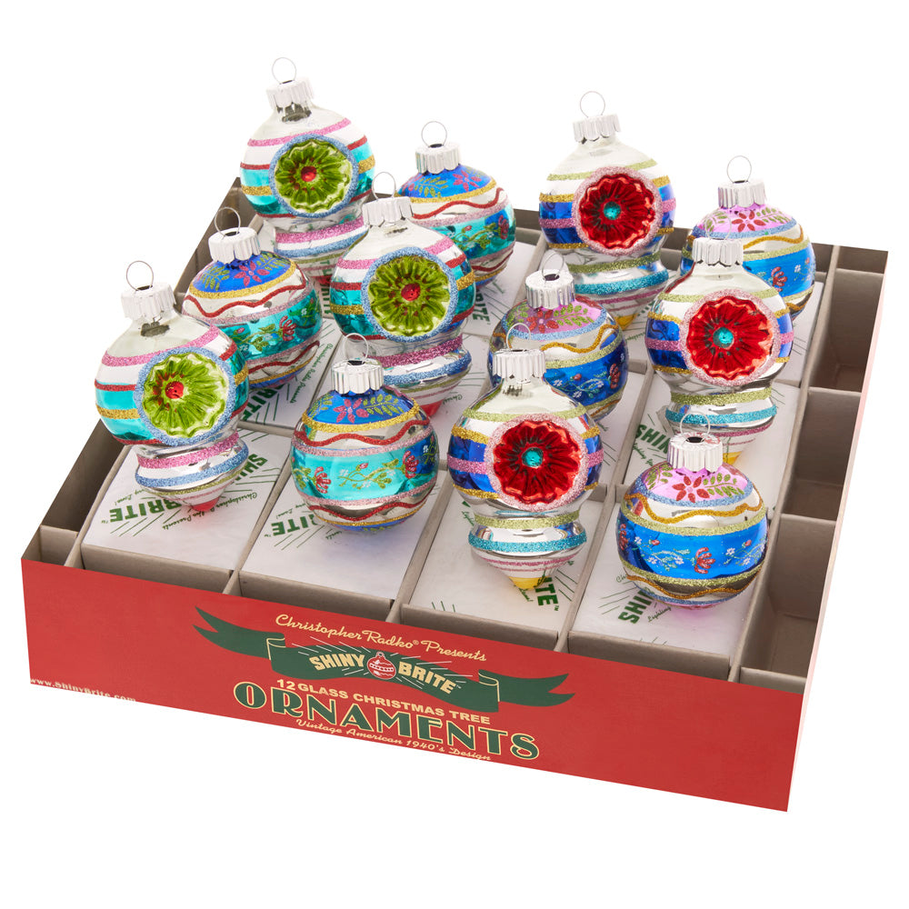 Boxed Set Ornament Description - Christmas Confetti 12 Count 1.75" Decorated Rounds & Shaps: With a variety of colorful rounds and shapes, this confetti-toned ornament set adds vintage style and a fun vibe to your tree.