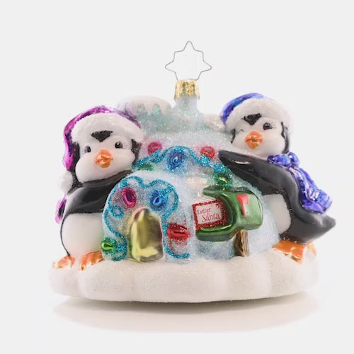 Video - Ornament Description - Welcome Home Igloo: This pair of penguins have adorned their icy igloo in holiday lights, read to greet Santa on Christmas Eve! This video shows the ornament spinning slowly. 