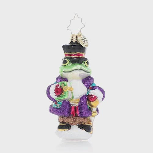 Video - Ornament Description - One Academic Amphibian Gem: This brainy bullfrog is looking toad-ally dapper in his top hat and coat. He's as smart as he is stylish! This video shows the ornament spinning slowly. 